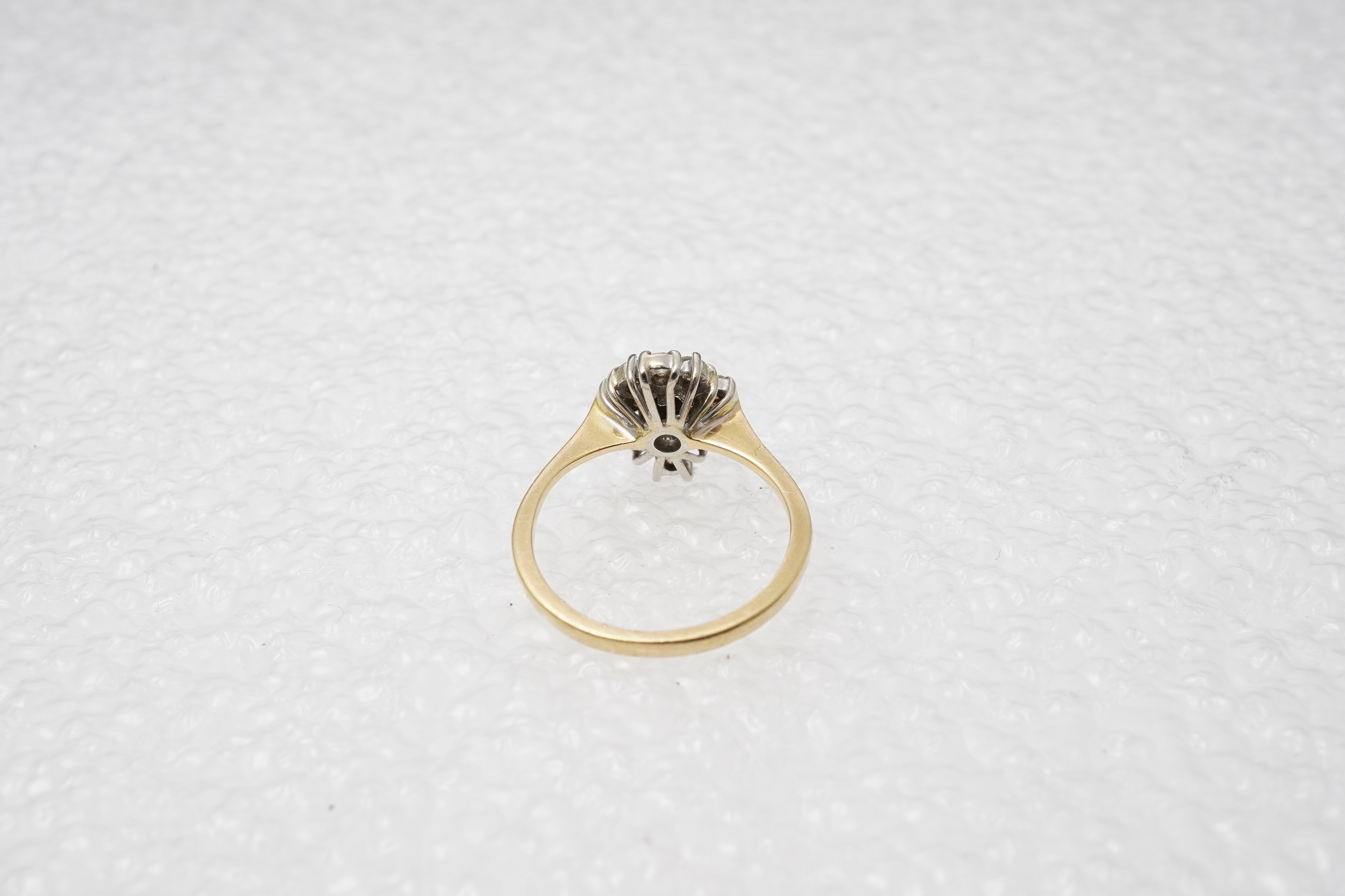 A diamond cluster ring